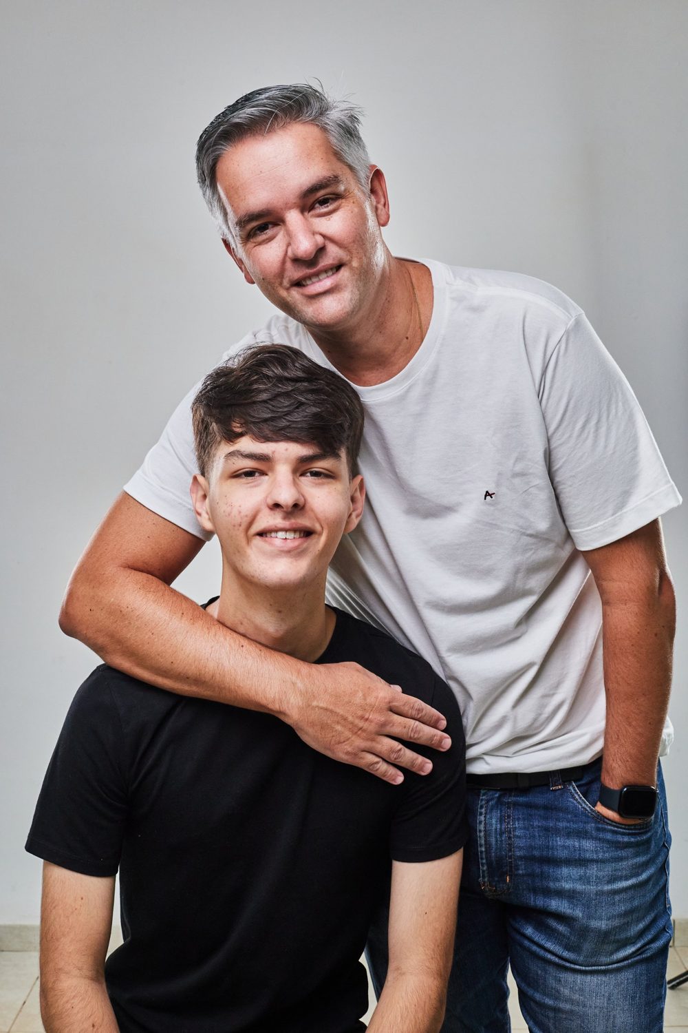 Victor Lemos, concluinte de 2025, com o pai
